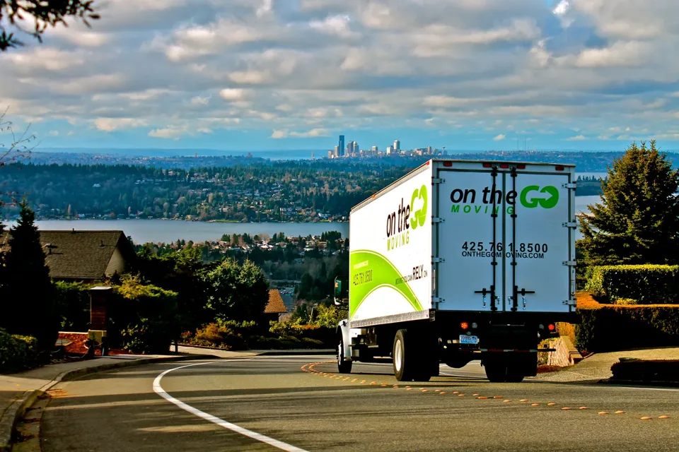 On The Go Moving truck with the Bellevue skyline in the background
