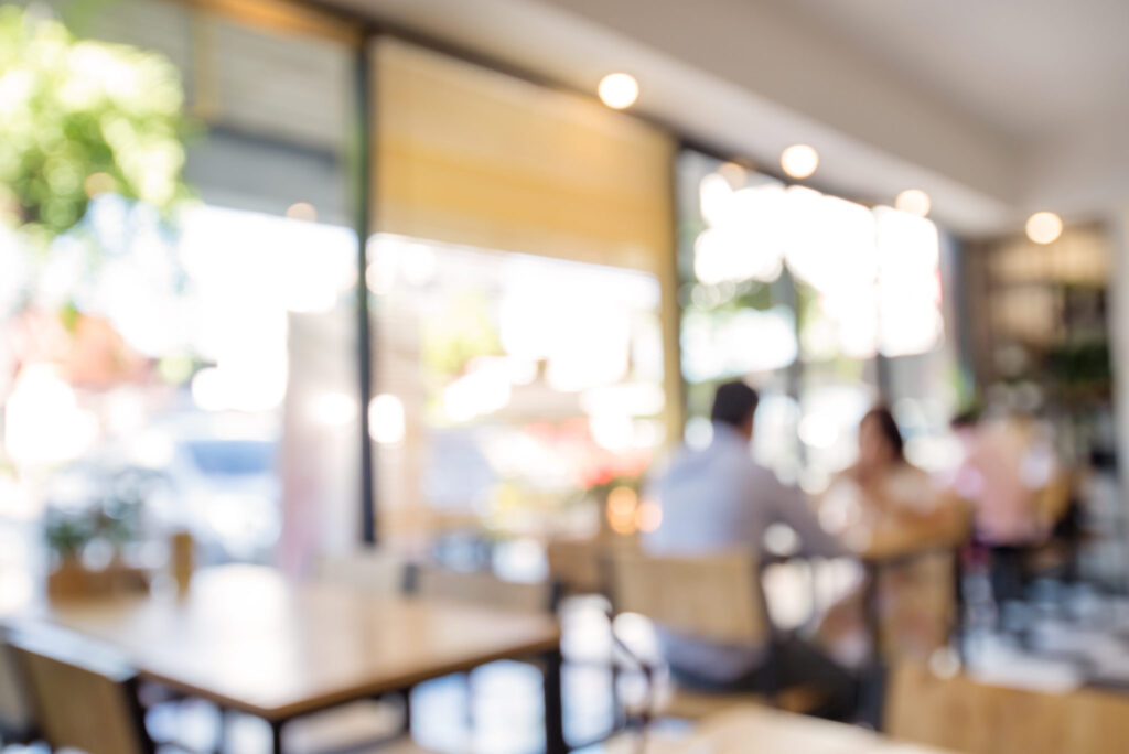 blurred background of restaurant with people